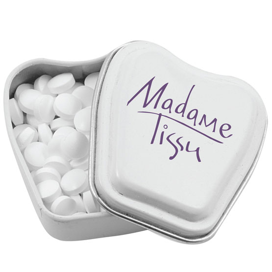Tooth-shaped mints in a branded tin