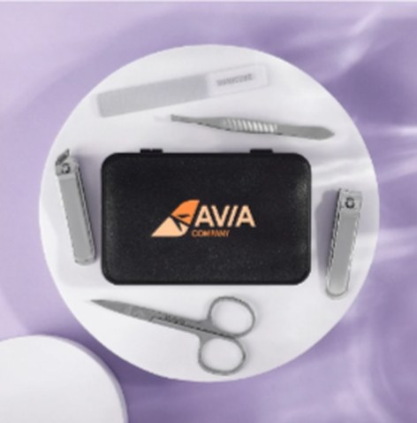 Branded manicure set with clippers, scissors and files arranged around a logo case on a purple background